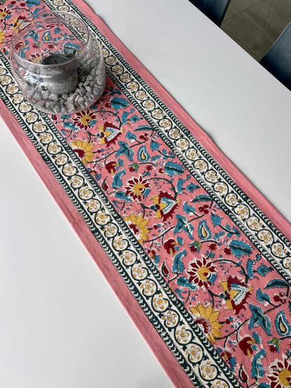 pink floral hand block printed table runner in cotton canvas 