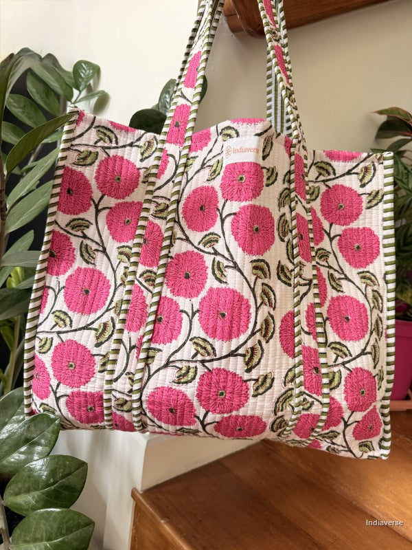 Floral patterned bag with pink flowers on a white background