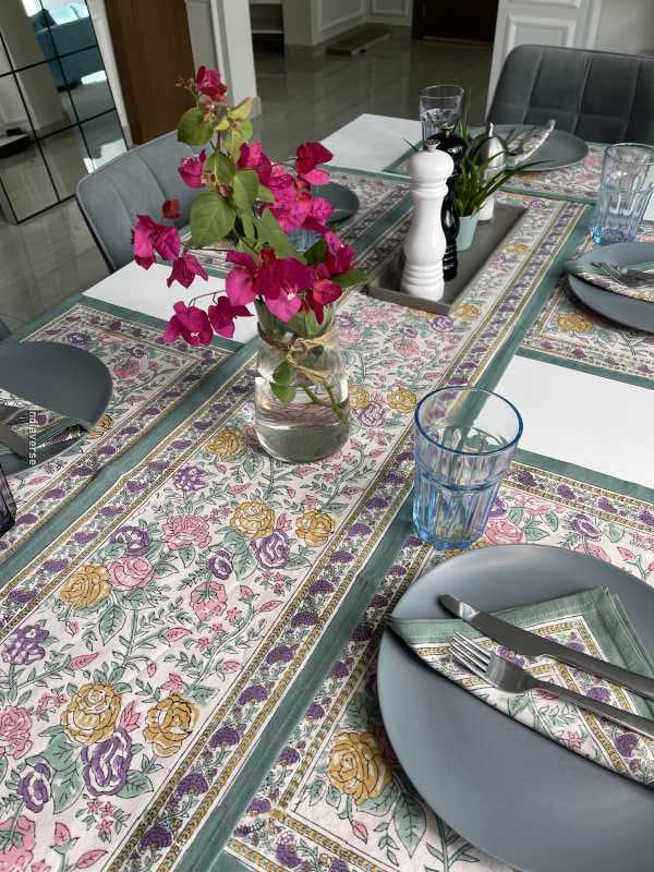 Exquisite 6-piece hand block printed placemat and napkin set in pure cotton stand out with a green purple floral design