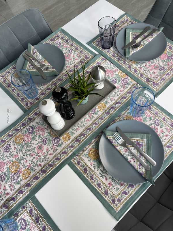 Exquisite 6-piece hand block printed placemat and napkin set in pure cotton stand out with a green purple floral design