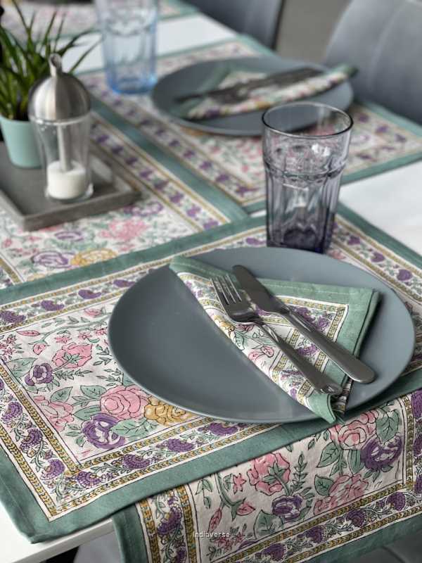 Exquisite 6-piece hand block printed placemat and napkin set in pure cotton stand out with a green purple floral design