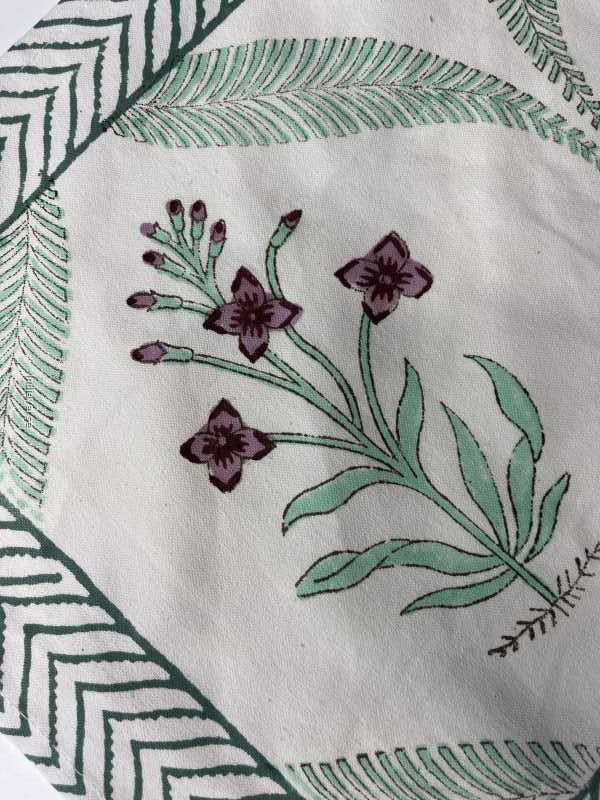 Exquisite 6-piece hand block printed placemat and napkin set in pure cotton stand out with a green purple modern design