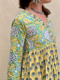Woman wearing a floral dress with a neutral background