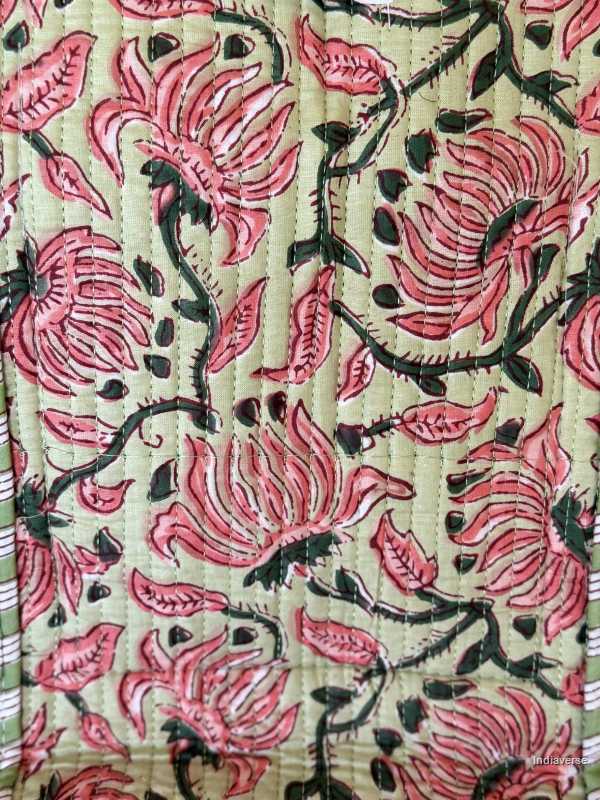 Quilted cotton tote bag in melon hue with red floral design close up photo of the design pattern | Spring Queen