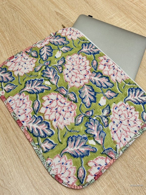Floral-patterned mouse pad on a wooden surface