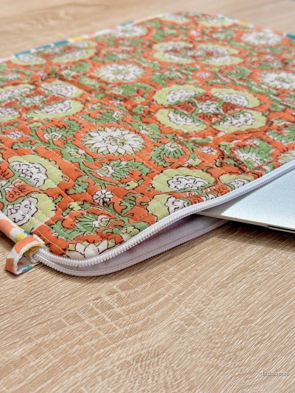 Floral patterned pouch on a wooden surface