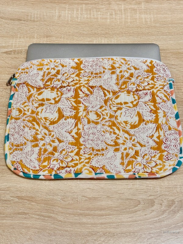 Floral patterned pouch on a wooden surface