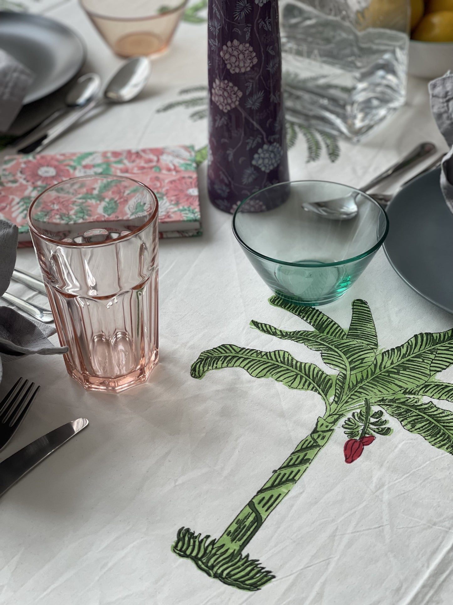 rectangular-tablecloth-for-6-seater-table-with-green-palm-tree-design-on-a-white-background-and-with-green-border