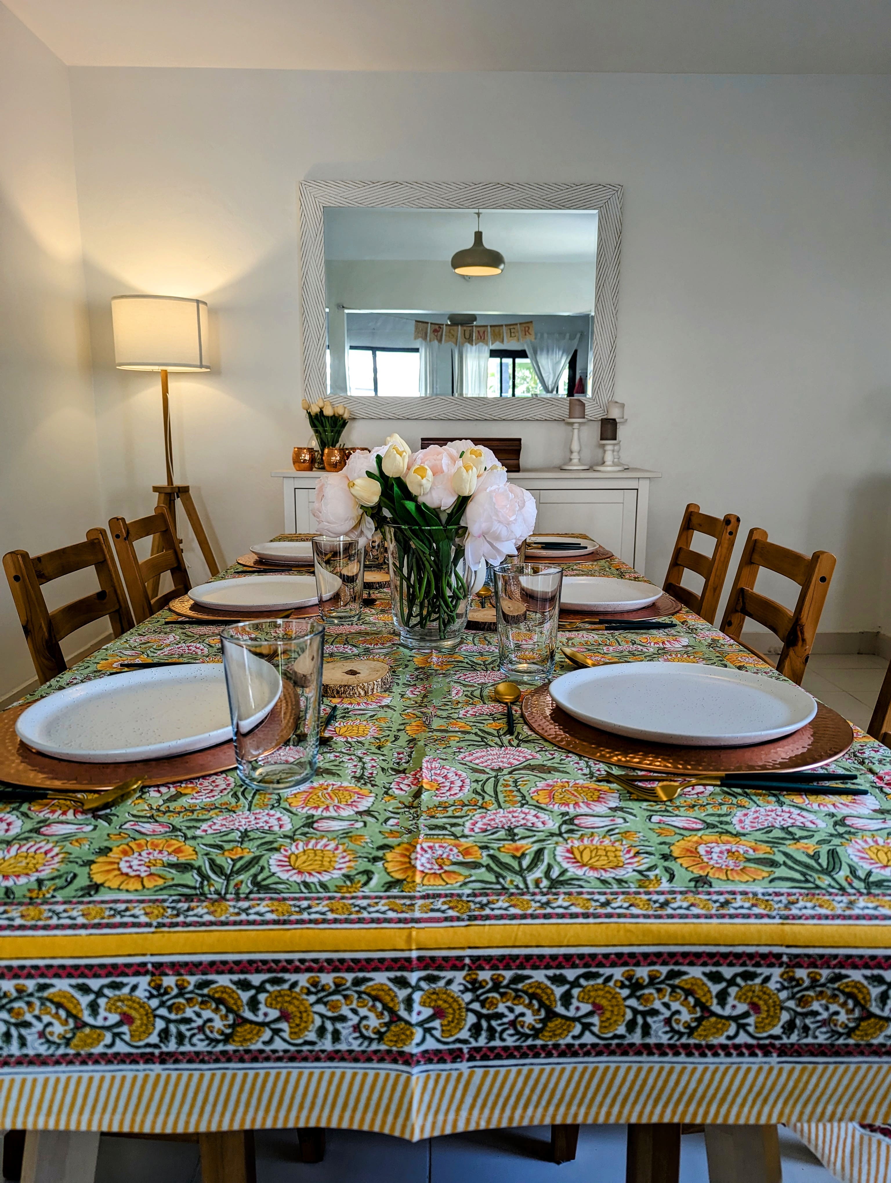 rectangular-tablecloth-for-6-seater-table-with-yellow-flower-design-on-green-background-with-yellow-flower-border