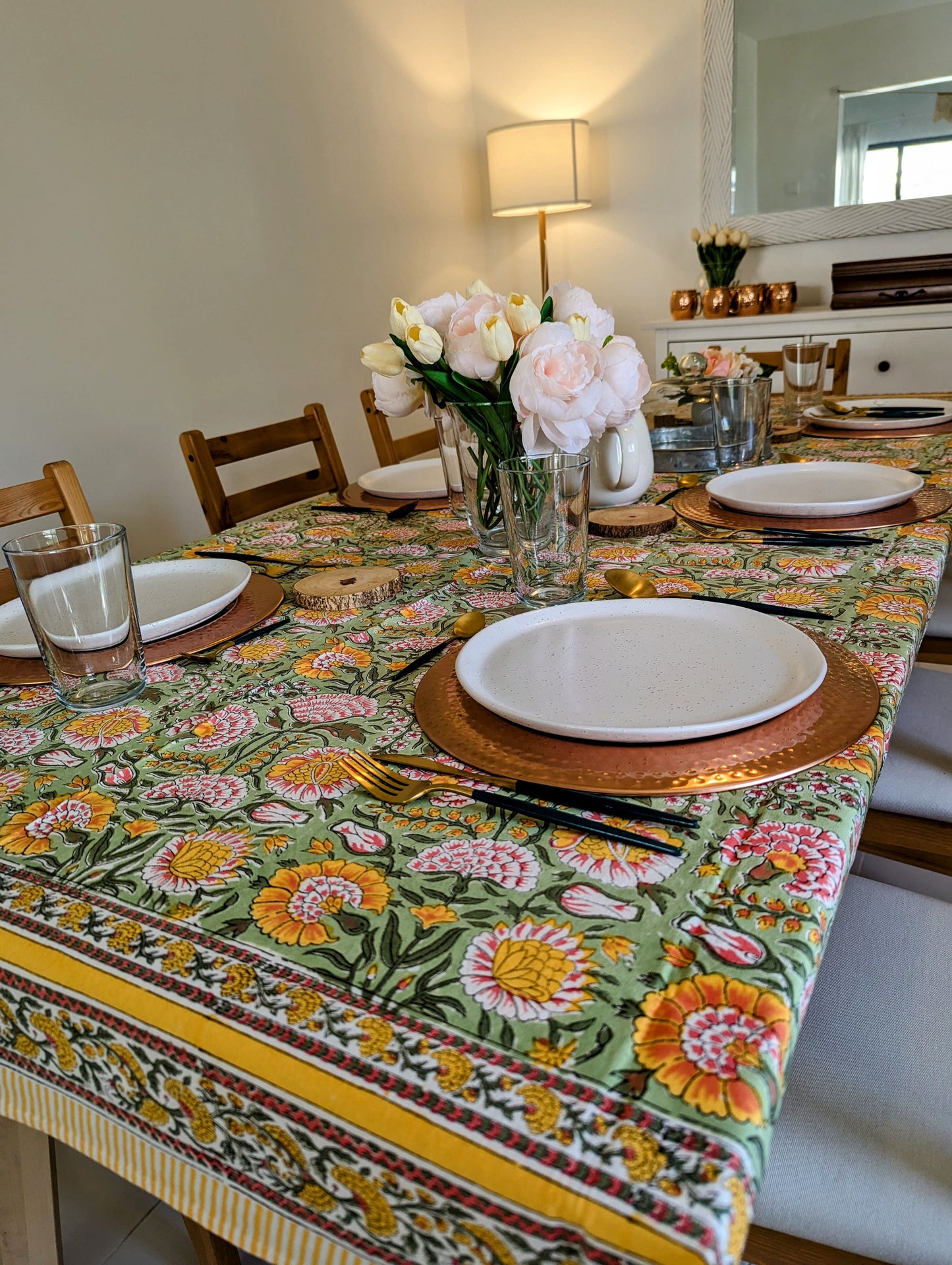 rectangular-tablecloth-for-6-seater-table-with-yellow-flower-design-on-green-background-with-yellow-flower-border