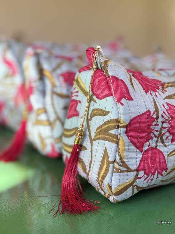 Toiletry Pouch Set with red tulip design and sky blue background in three different sizes for toiletries and cosmetics | Red Tulips