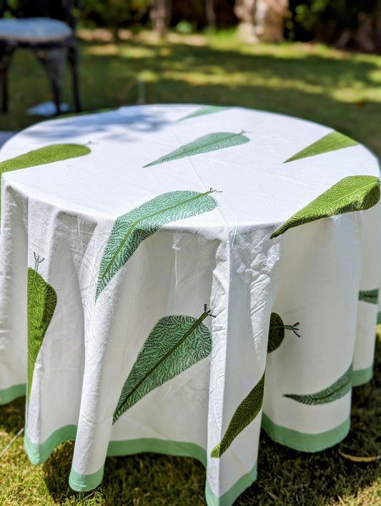 round-tablecloth-with-handblock-printed-cypress-tree-on-white-background-with-green-border