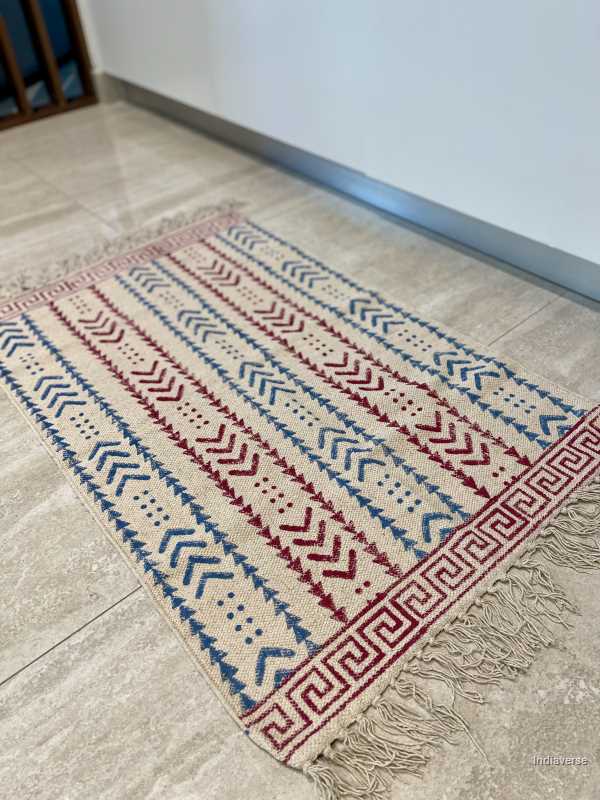 small cotton rug hand block printed with geometrical red and blue pattern perfect for the kitchen, living room or bedroom