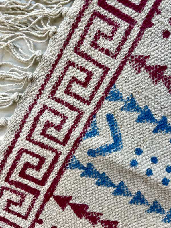 small cotton rug hand block printed with geometrical red and blue pattern perfect for the kitchen, living room or bedroom