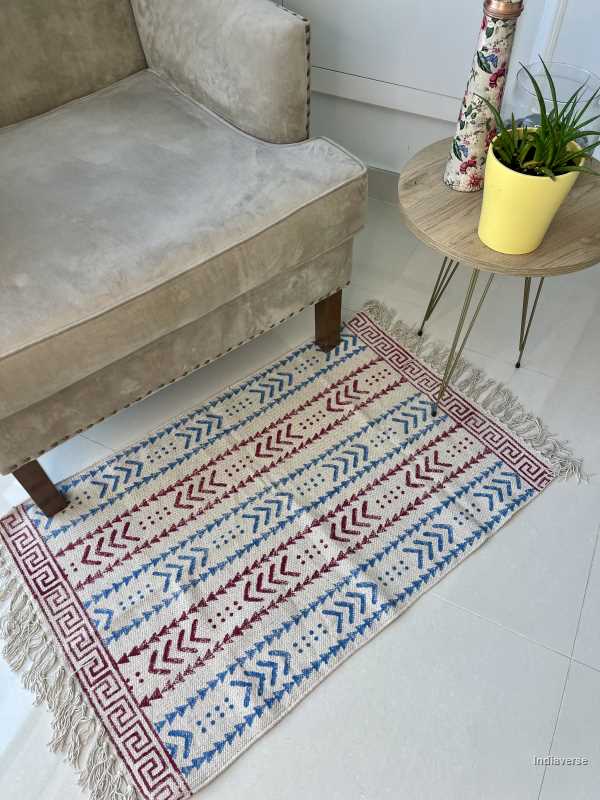 small cotton rug hand block printed with geometrical red and blue pattern perfect for the kitchen, living room or bedroom
