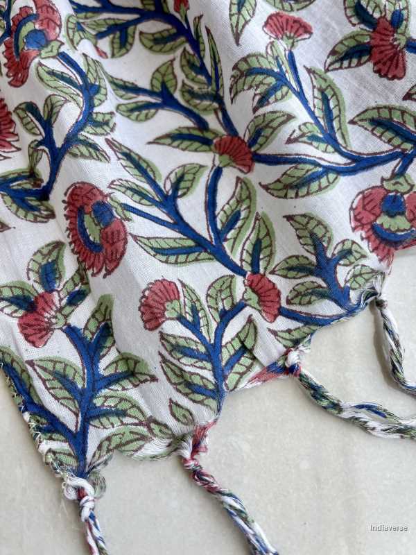 red flowers design with blue and green stems hand block printed cotton lightweight and perfect for any occasion 