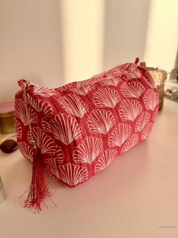 Close up of one pouch from the set of three red pouches with sea shell print | Red Sea Shell