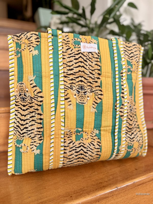 Decorative tote bag with tiger pattern on a wooden surface