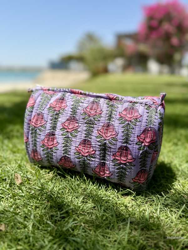 Toiletry Pouch Set with pink lotus flower design and purple color for toiletries and cosmetics in three sizes small, medium and large | Lotus Flowers