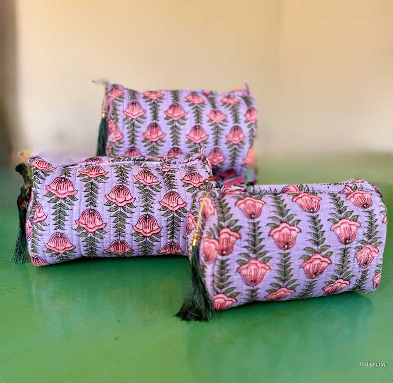 Toiletry Pouch Set with pink lotus flower design and purple color for toiletries and cosmetics in three sizes small, medium and large | Lotus Flowers