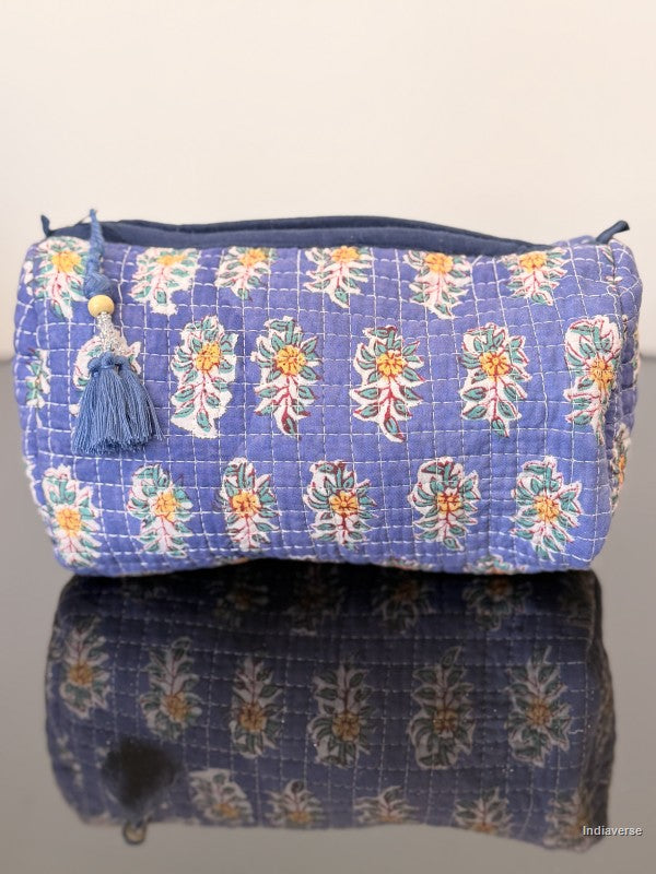 Floral-patterned pouch with a blue background