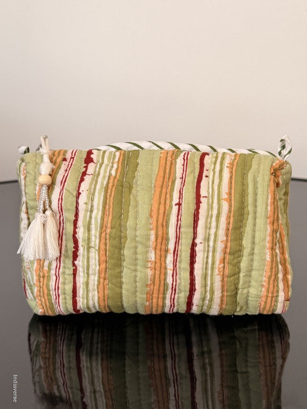 Colorful striped fabric bag on a gray background