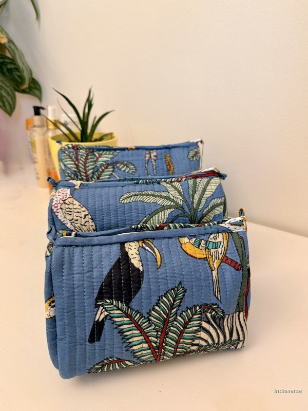 Set of three blue fabric bags with tropical animal designs on a white surface | Tropical Jungle
