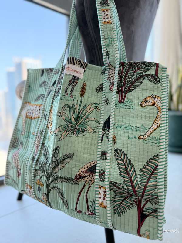 Tote bag with animal and plant pattern on a mannequin